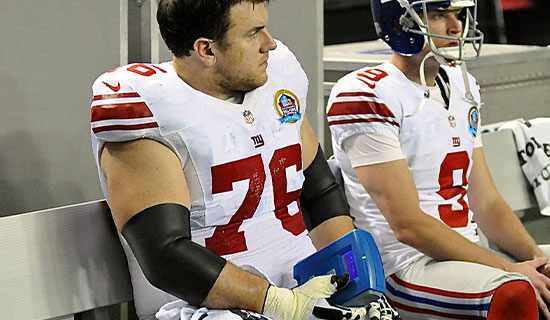 Football Players sitting